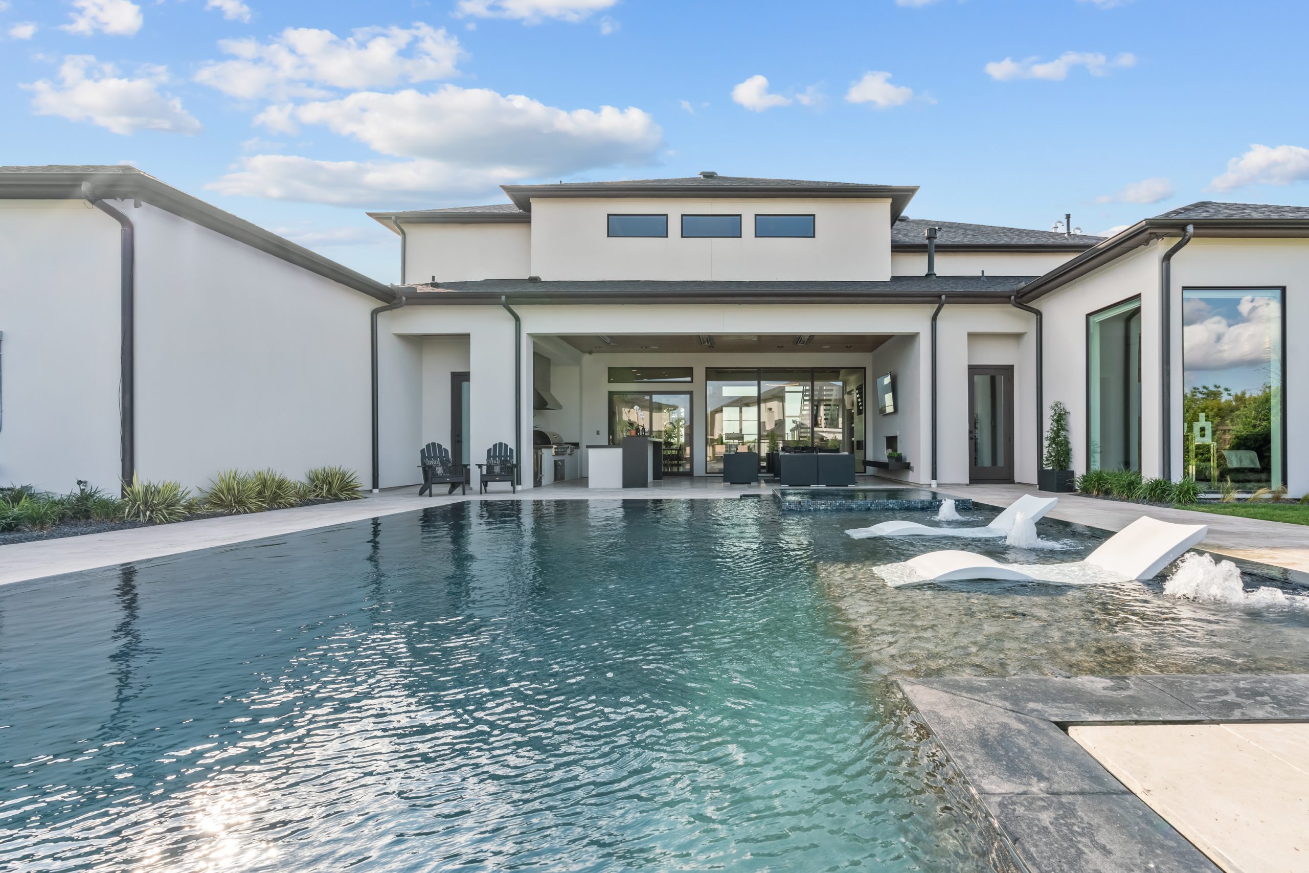 Luxury home in North Dallas featuring modern architecture and elegant landscaping