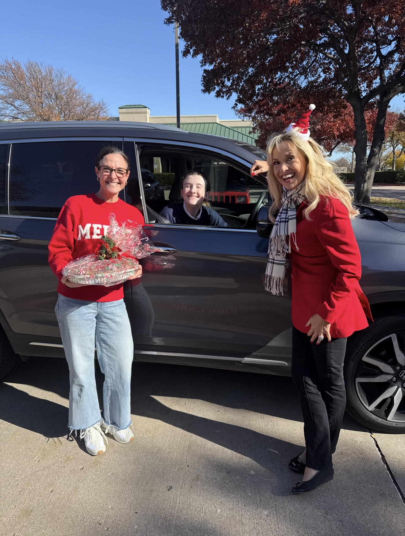 Client appreciation moment during Jan Richey Team Christmas pie day at KW Legacy