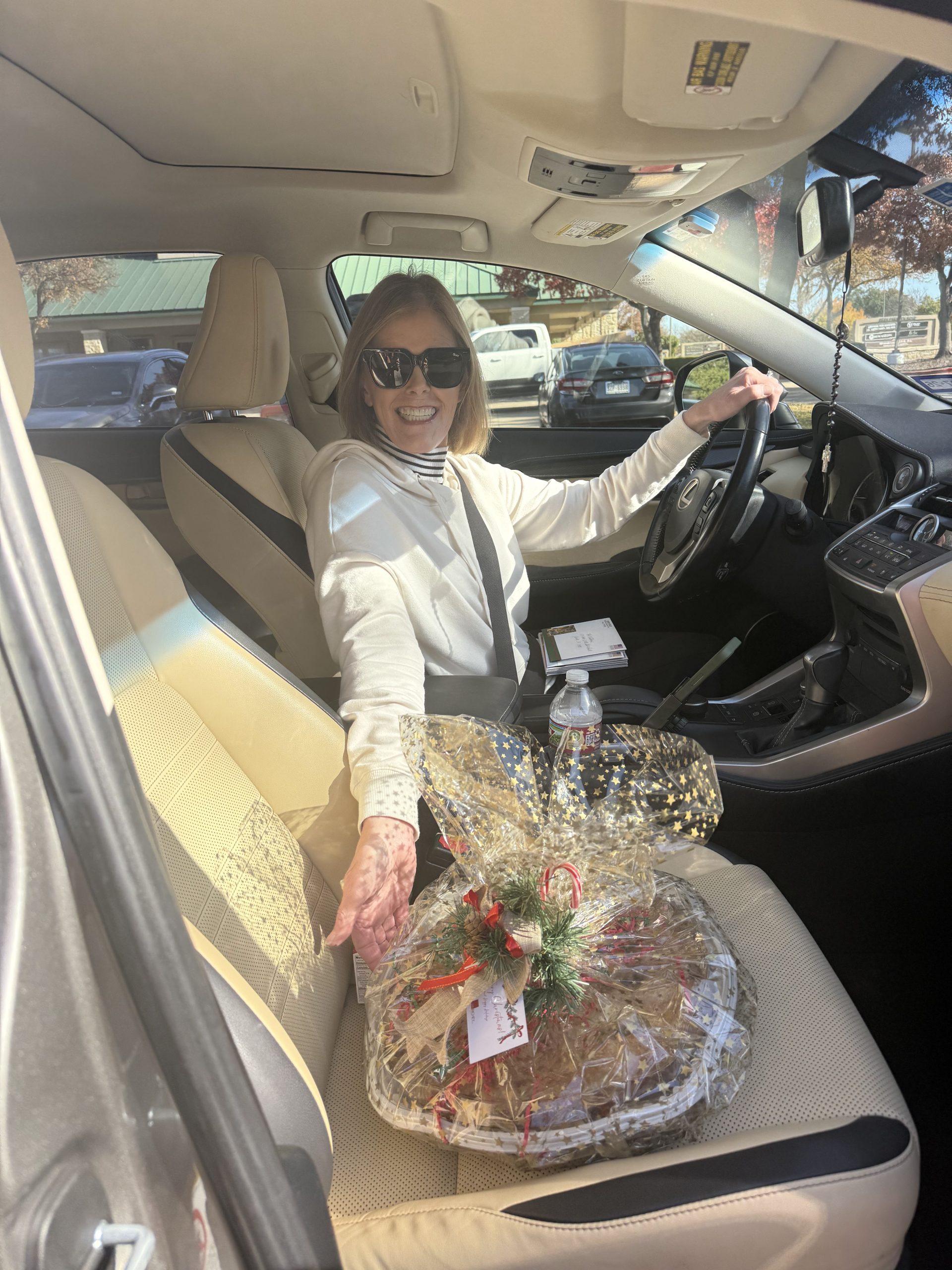 Jan Richey Team celebrating holiday pie giveaway with friends family and clients at KW Legacy Plano