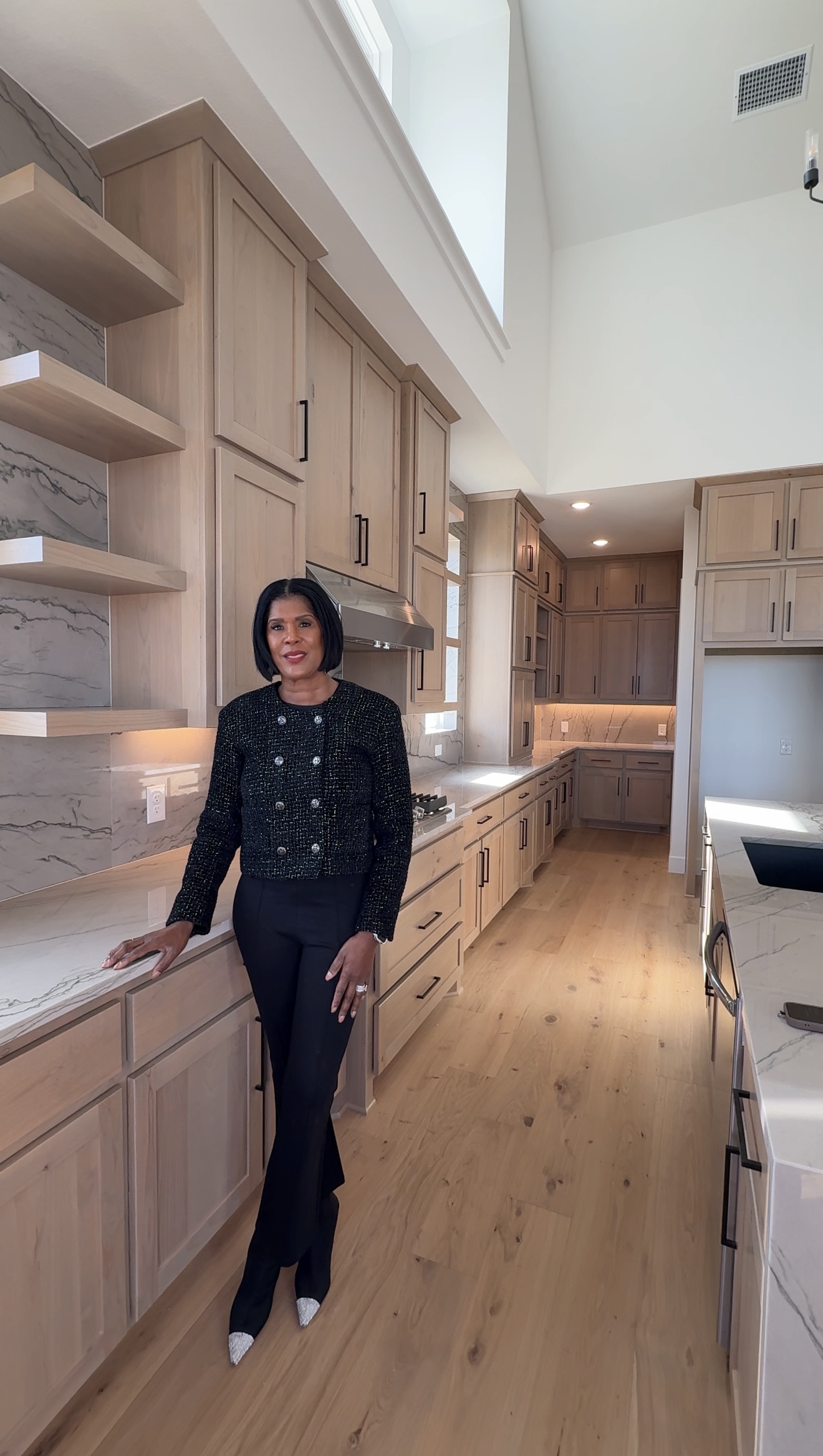 Yolanda Durant at final walkthrough of luxury new construction kitchen in Texas