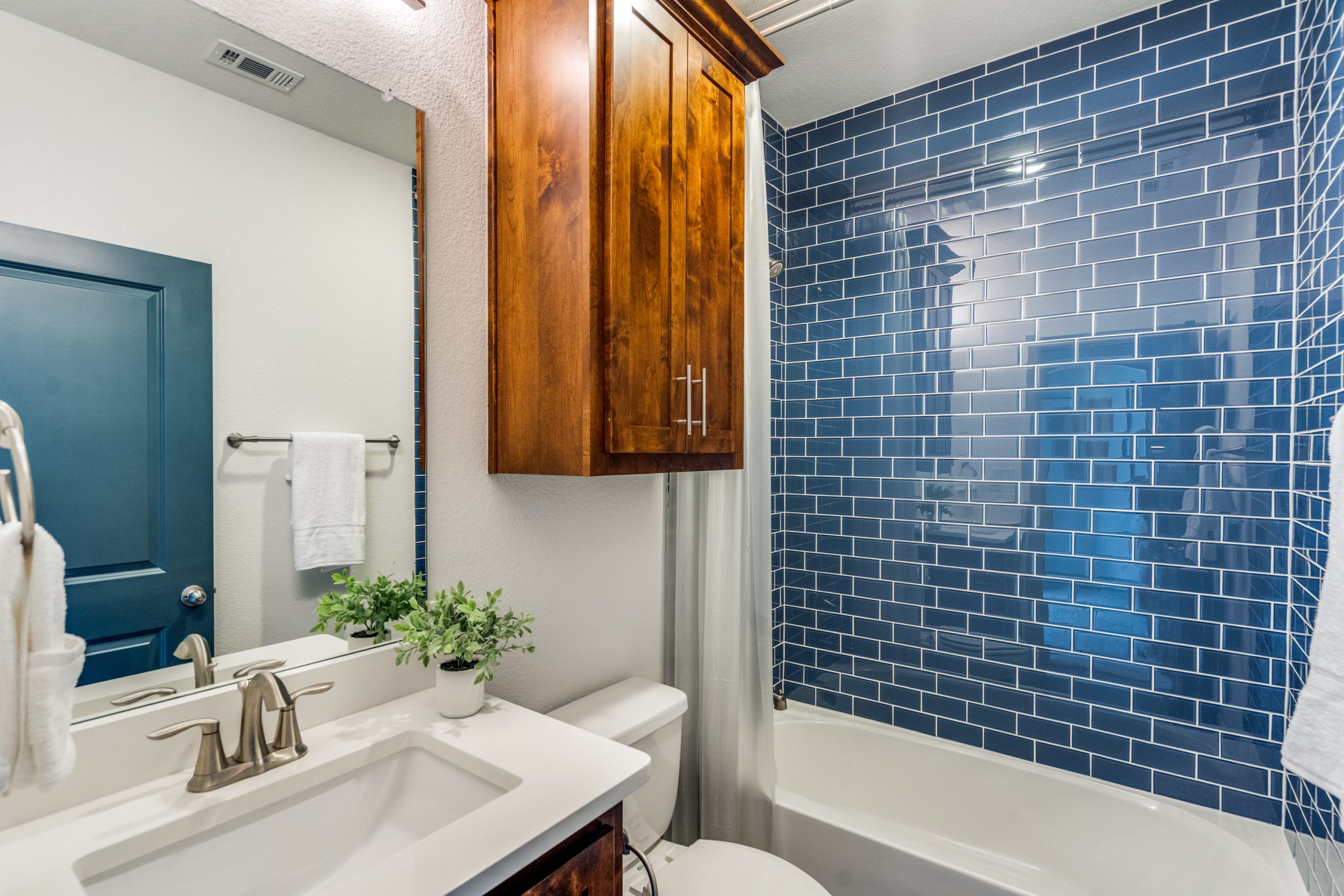 Luxury bathroom with updated finishes and spa-inspired design.