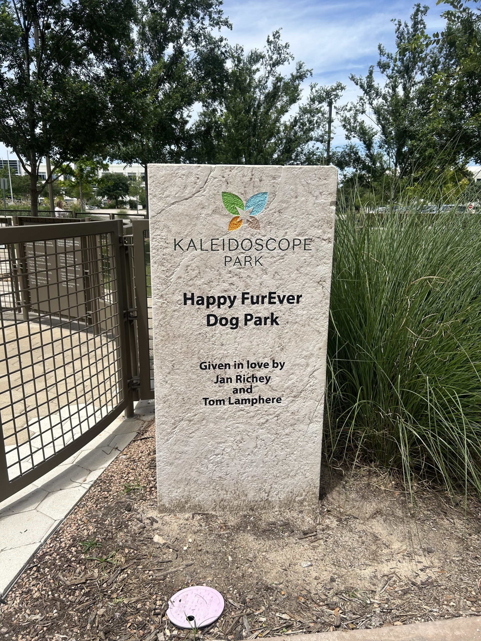 Happy FurEver Dog Park sign at Kaleidoscope Park in Frisco, Texas