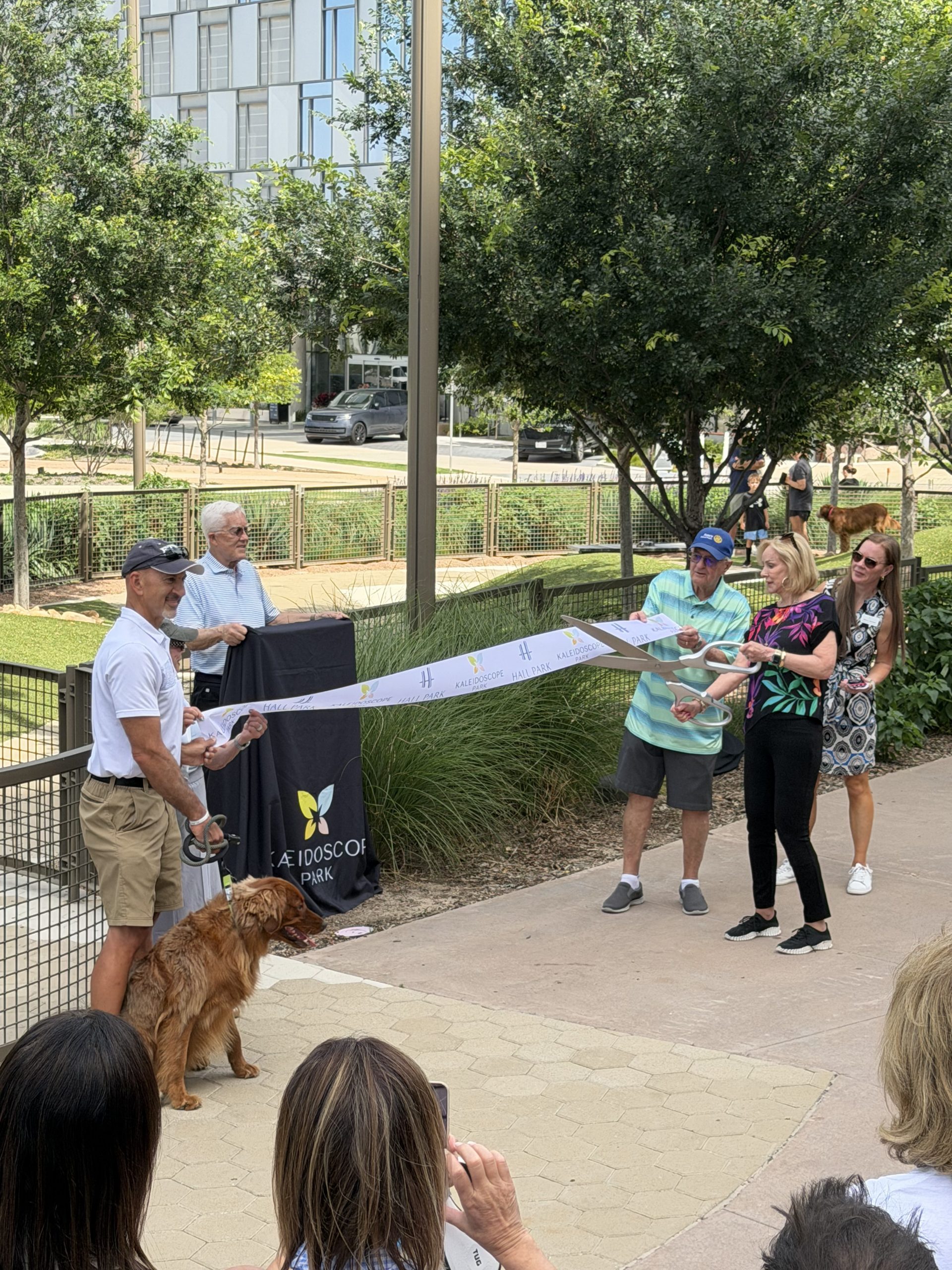 Jan Richey, Tom Lamphere, Shawn Jackson, and park representatives cut the ribbon at the Happy FurEver Dog Park in Frisco, Texas