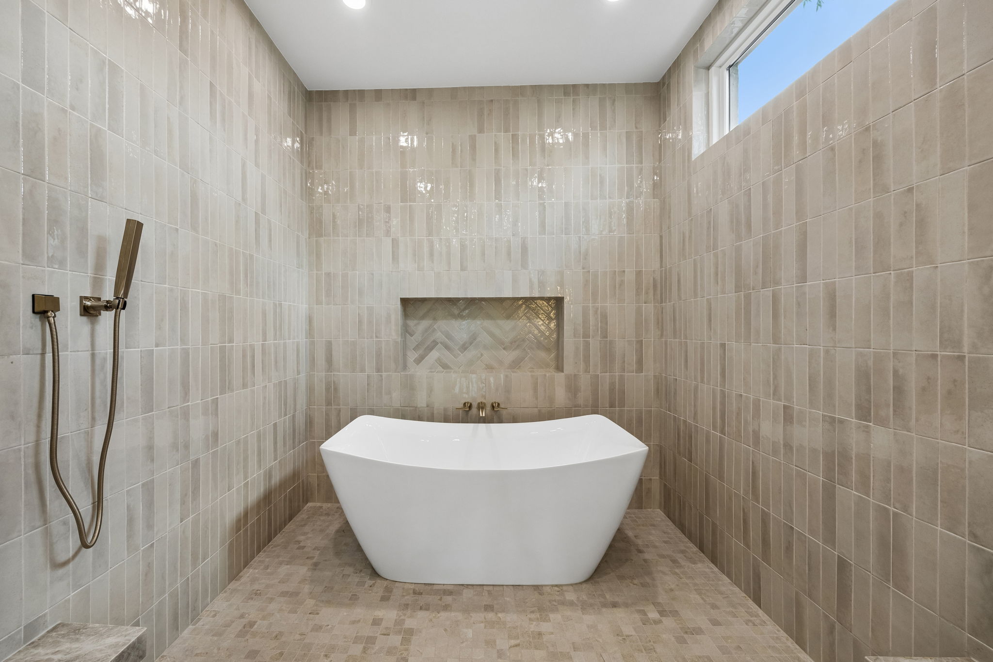 Primary bathroom wet room with rain shower at 9939 Ontario Lane