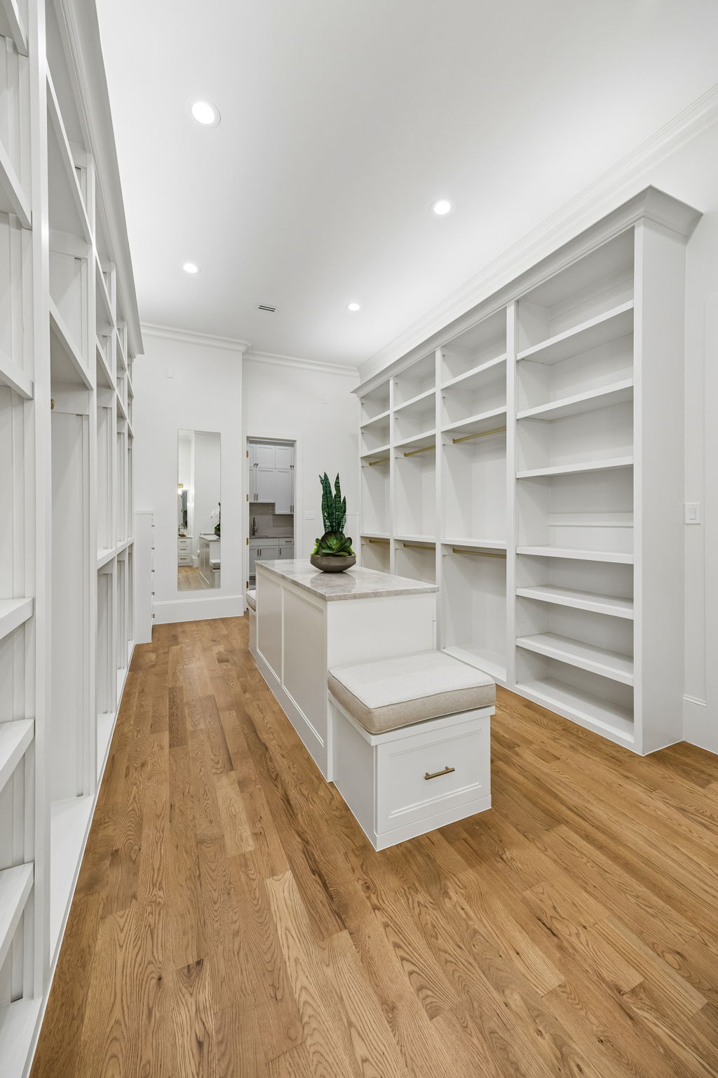 Custom primary closet at 9939 Ontario Lane luxury home in Dallas