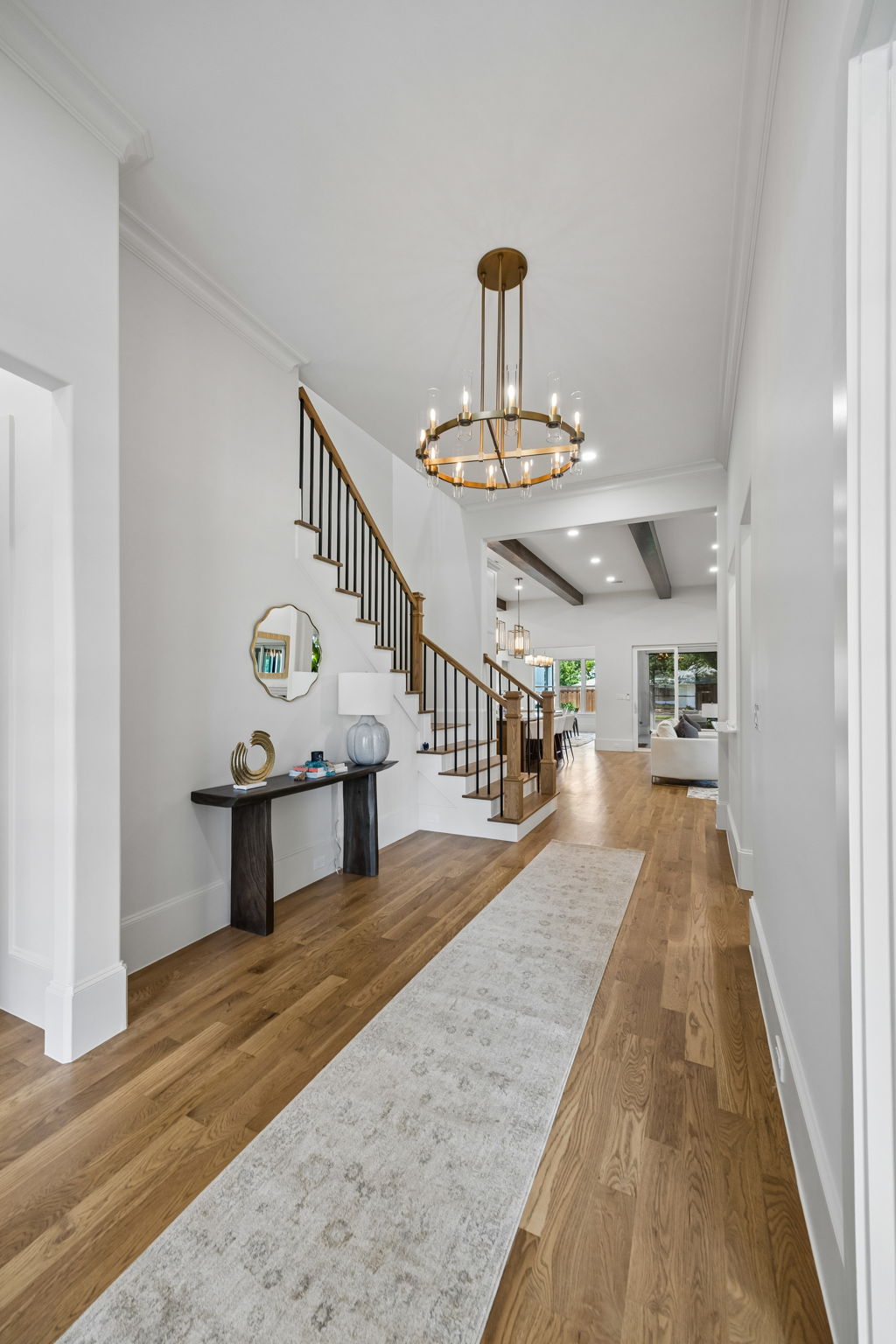 Entryway with Restoration Hardware chandelier at 9939 Ontario Lane